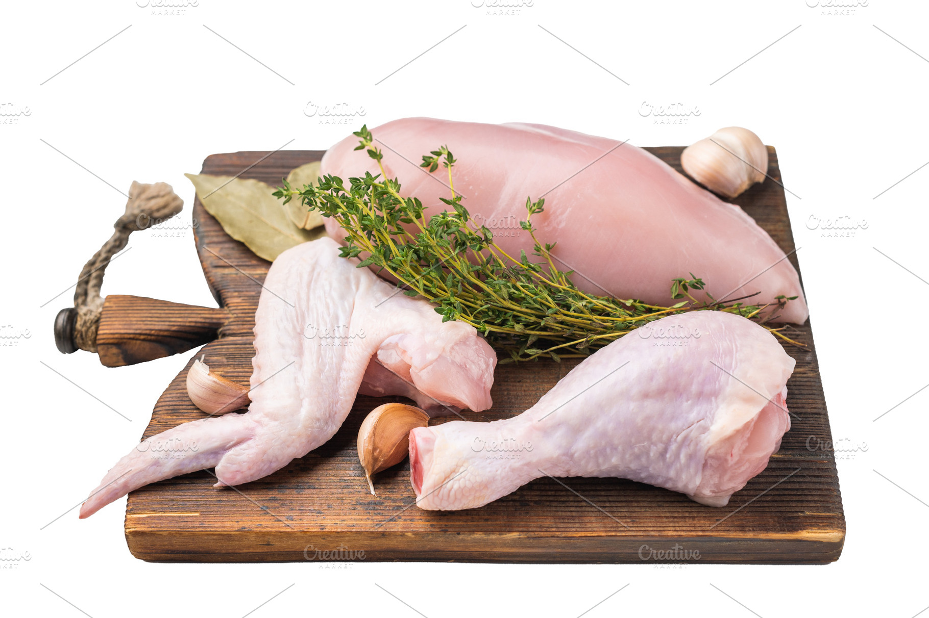 Raw chicken cuts: boneless breast, wing, and drumstick on a rust, a Photo by composter-box@mail.ru