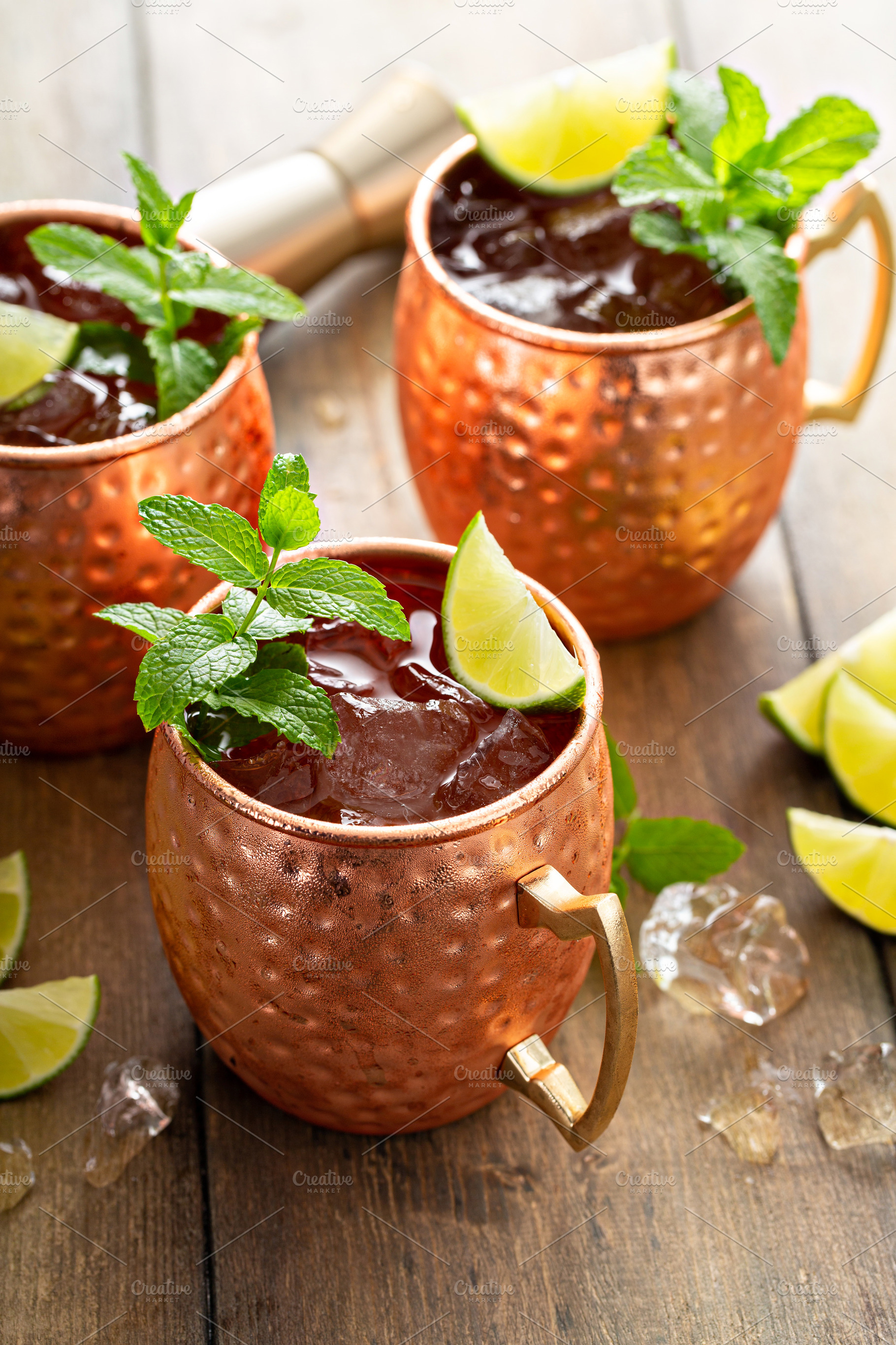Traditional Moscow Mule in classic copper mugs, a Food & Drink Photo by farwasser