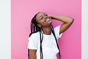 Smiling female with closed eyes, a Person Photo by Artem Varnitsin