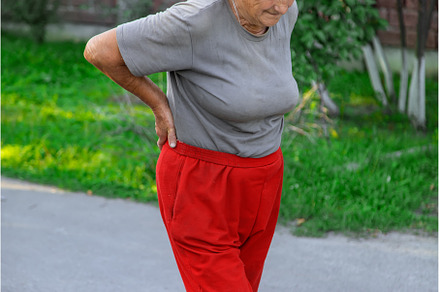 grandmother hurts her back on the, a Person Photo by yanadjana