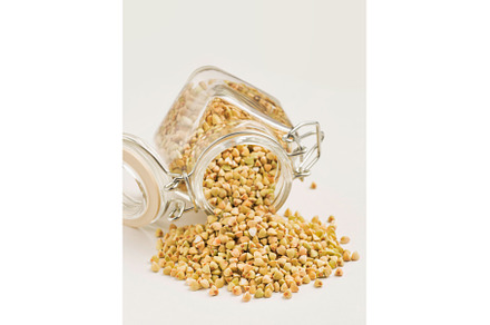 Raw green buckwheat in bank on white, a Food & Drink Photo by Fascinadora