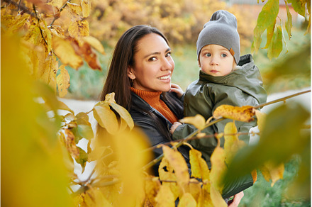 beautiful woman with a baby in her, a Person Photo by Super duper stock images 