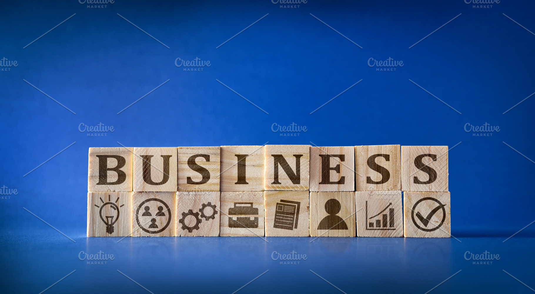 Business Concept with Wooden Blocks and Symbols, a Business Photo by Davizro's Market