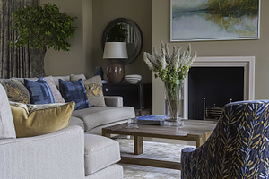 Contemporary living room interior design featuring a comfortable sofa, patterne, an Architecture Photo by Studio ANNA