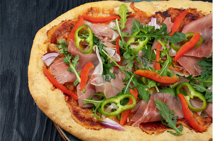 Italian Pizza on plate with jamon, a Food & Drink Photo by Jan Jack Russo Media