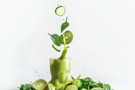 Splashing of green smoothie, a Health & Medical Photo by VICUSCHKA