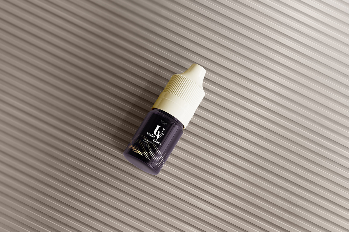 Violet Glass Dropper Bottle Mock-up, a Cups & Container Mockup by pmvch (Photo 16 of 20)