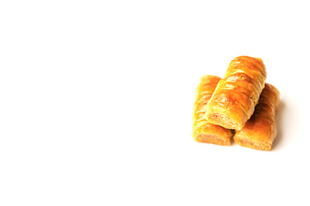 Oriental sweet baklava isolate on a, a Food & Drink Photo by yanadjana