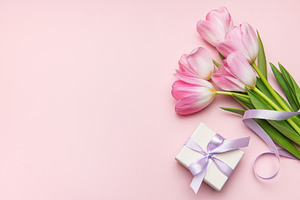 Pink tulips and gift box on pastel pink background for mother's, a Holiday Photo by Olena Rudo