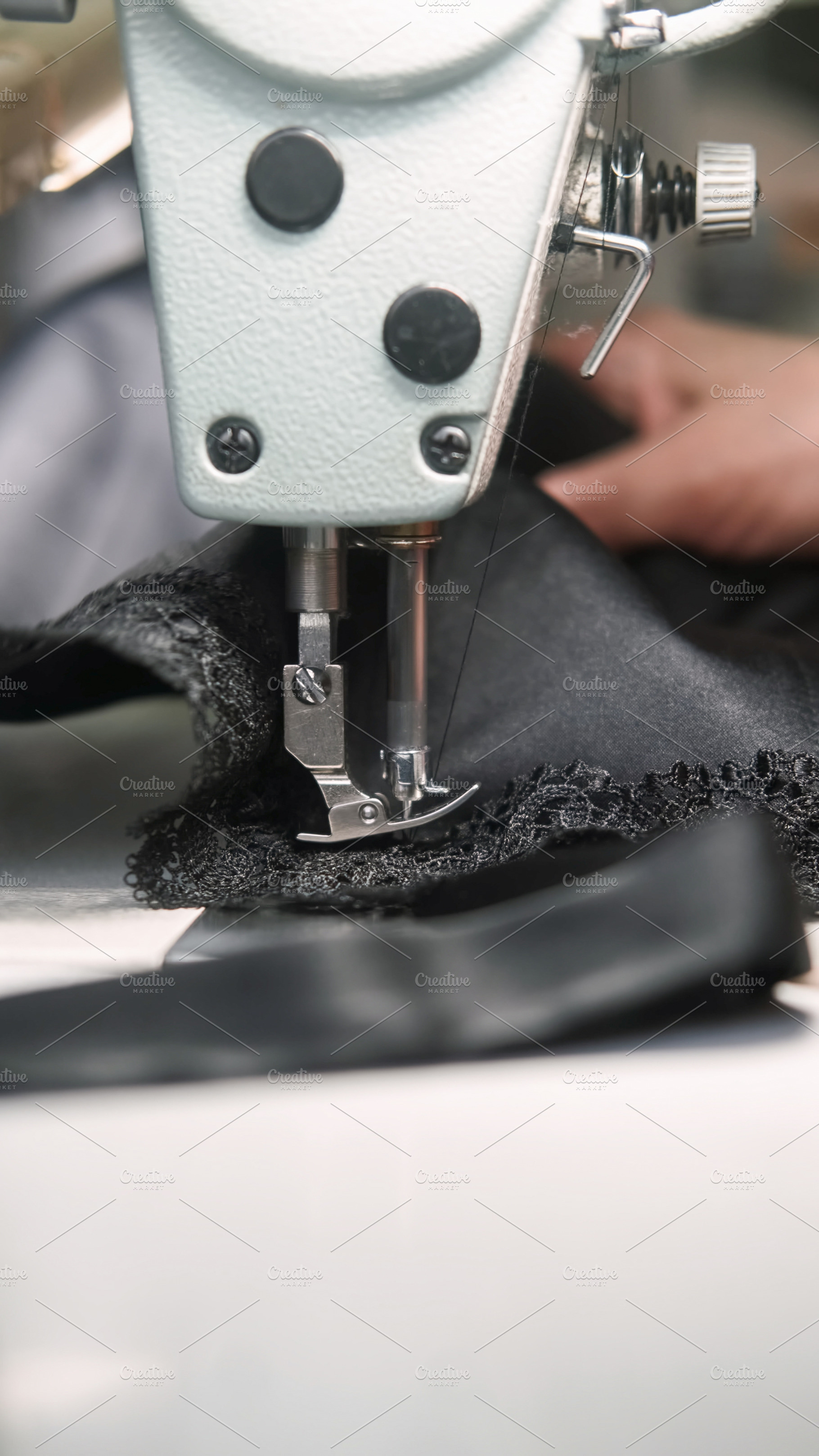 Clothing production sewing lace dressmaker hand, a Person Photo by Photo Drive Studio