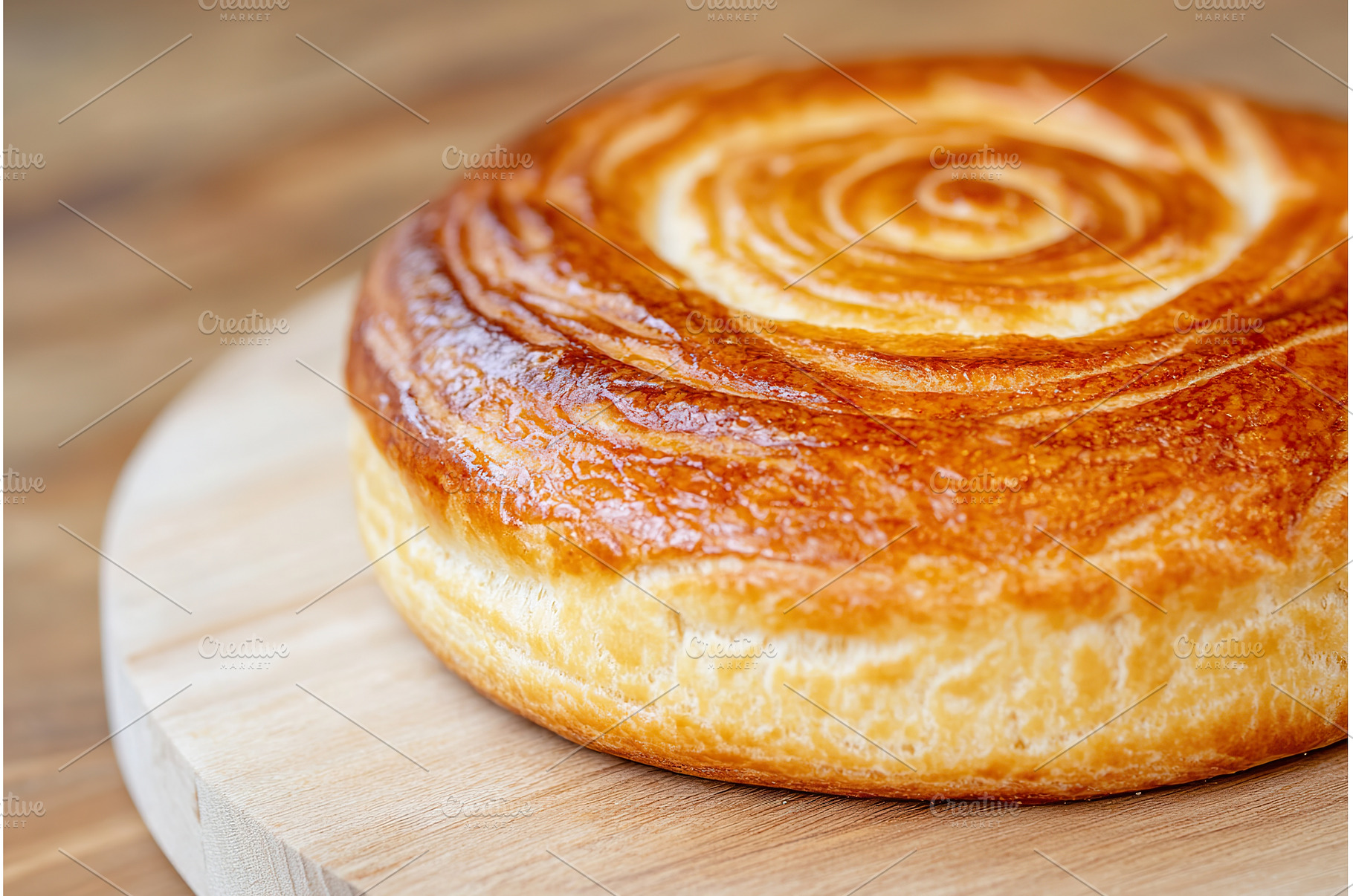 Golden spiral brioche bread on, a Food & Drink Photo by Lermont51
