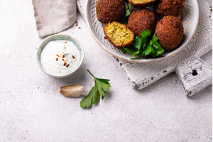 Middle Eastern falafel balls with, a Food & Drink Photo by Yulia Furman