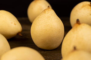 ripe pears with light skins, sweet pears of white color with spots on the skin, a Photo by rsoollAI