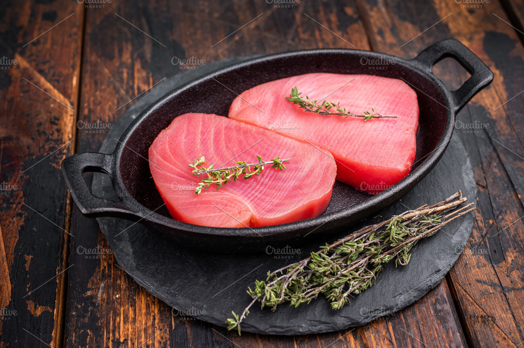 Vibrant raw tuna steak, showcasing its deep red hue, an essentia, a Food & Drink Photo by composter-box@mail.ru