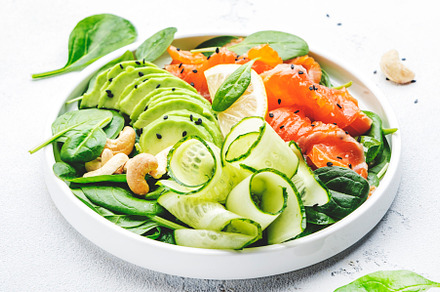 Salmon salad for ketogenic diet with avocado, spinach, cucumber,, a Food & Drink Photo by 5PH