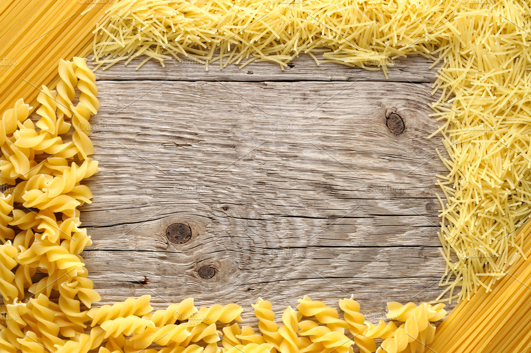 Frame made of pasta featuring cuisine, food, and fusilli