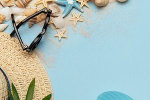 Beach accessories creating a summer holiday background with copy, a Holiday Photo by Olena Rudo