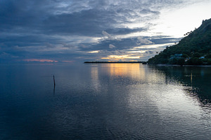 Sunset over the tranquil lagoon of Maupiti, French Polynesia, a Nature Photo by GoodGoods