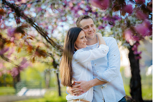 Young couple in love standing, a Person Photo by HalfPoint
