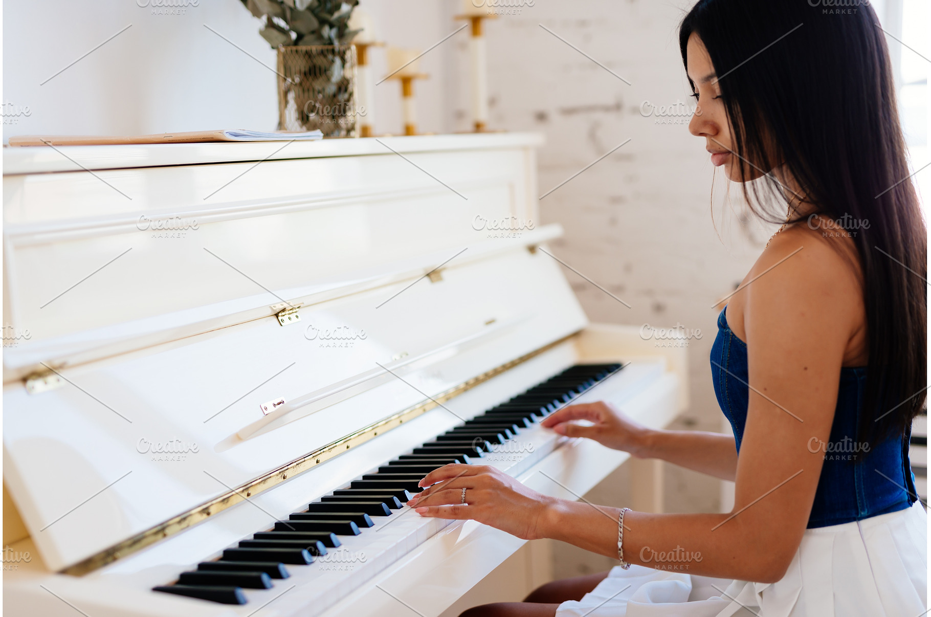 A girl playing the piano, a School & Education Photo by undrey