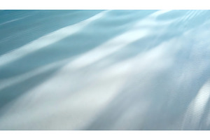 Soft ripples on a serene, light blue, an Abstract Photo by Igor Tichonow