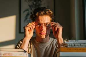 Teen with glasses, a Person Photo by Virgo Studio
