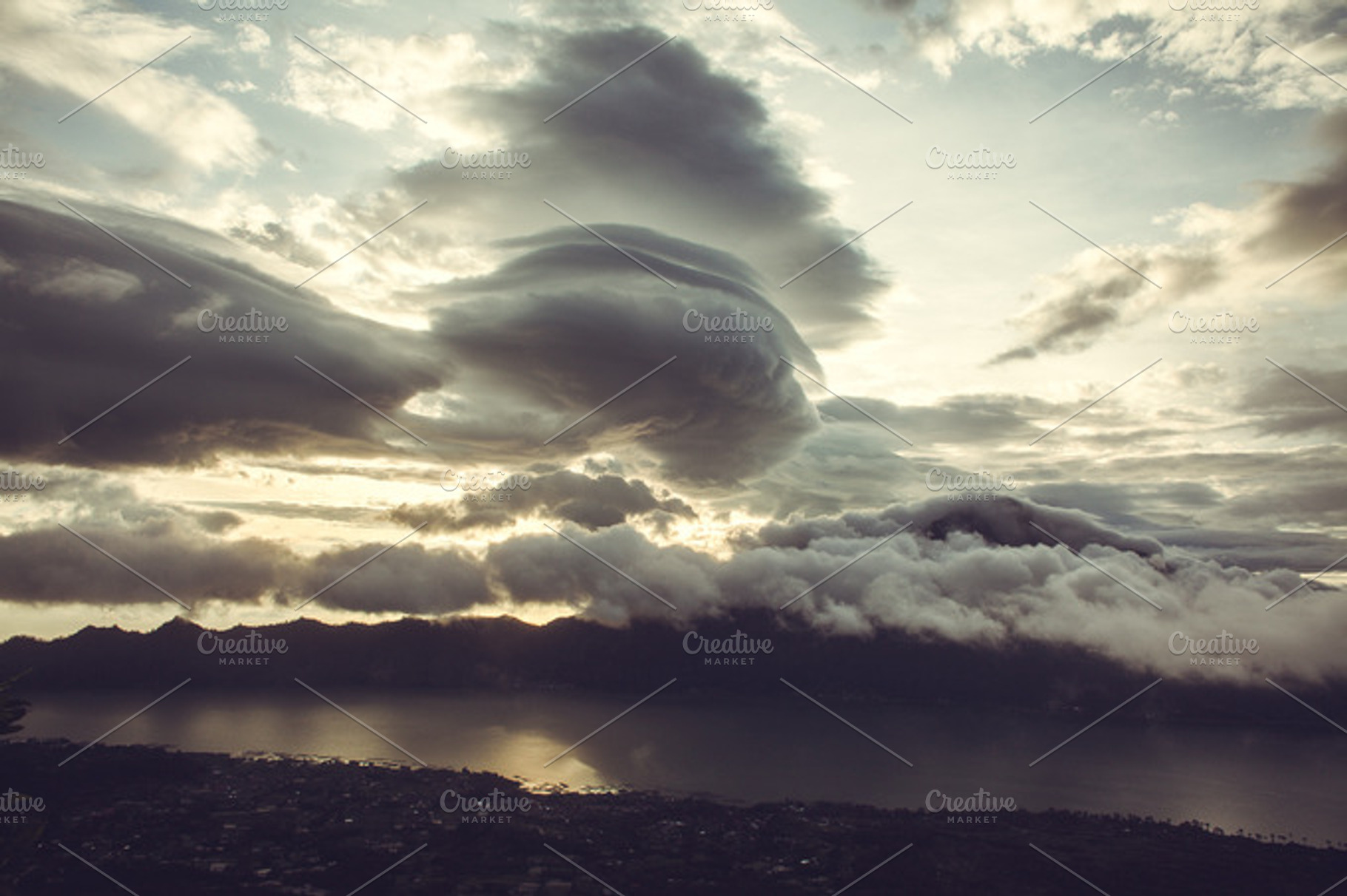 Sunrise In The Mountains Featuring Batur Volcano And Agung
