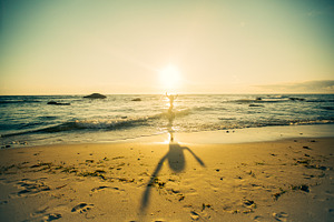Little girl's shadow along the sand stock photo containing marthas vineyard