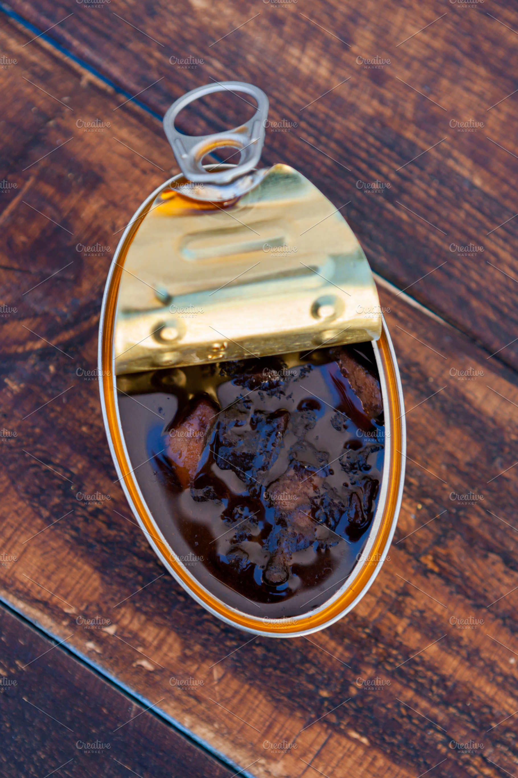 Canister of canned squid in its ink, a Food & Drink Photo by José Manuel Gelpi