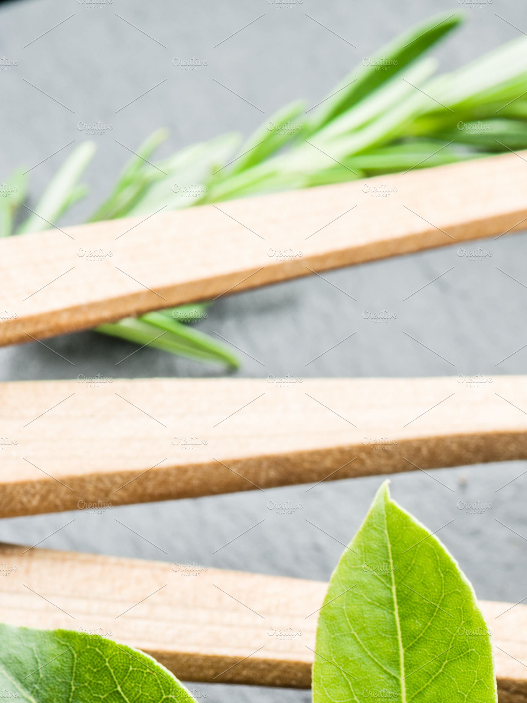 Assortment of colorful spices in the wooden spoons., a Food & Drink Photo by Volff