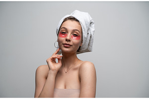 Young woman having a relaxing spa, a Health & Medical Photo by volodymyrshtun13795