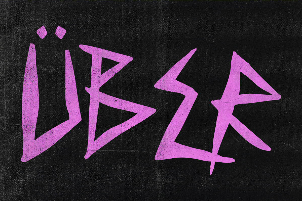ÜBER — Punk Rock Display Font, a Sans Serif Font by Mikey Weeks (Photo 2 of 7)