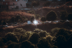 Sun Glare Bursts From Parked Car, an Architecture Photo by SkyNext