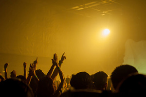 Music band crowds raising hands up in the air selective focus stock photo