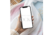 iPhone Mockup with Pastel Drapes, a Product Mockup by MockupWizard (Thumbnail 1 of 3)