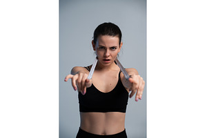 Determined young woman training with, a Sports & Recreation Photo by volodymyrshtun13795