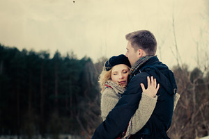 Happy couple embracing featuring couple, lovers, and a