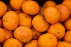 Top view of juicy ripe orange tangerines, a Photo by Prostock-Studio