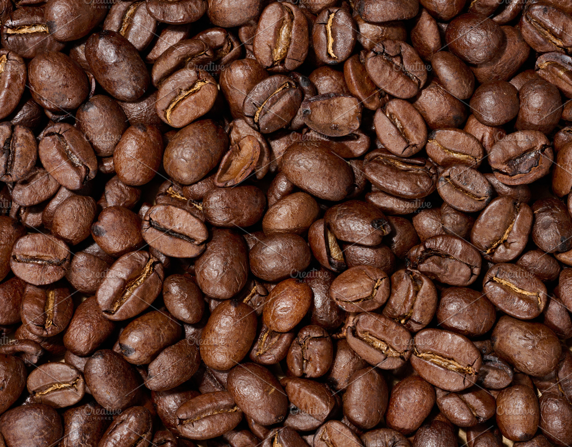 Scattered roasted coffee beans, full frame, a Food & Drink Photo by ndanko