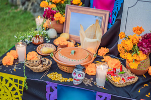 Mexican food offerings and flowers