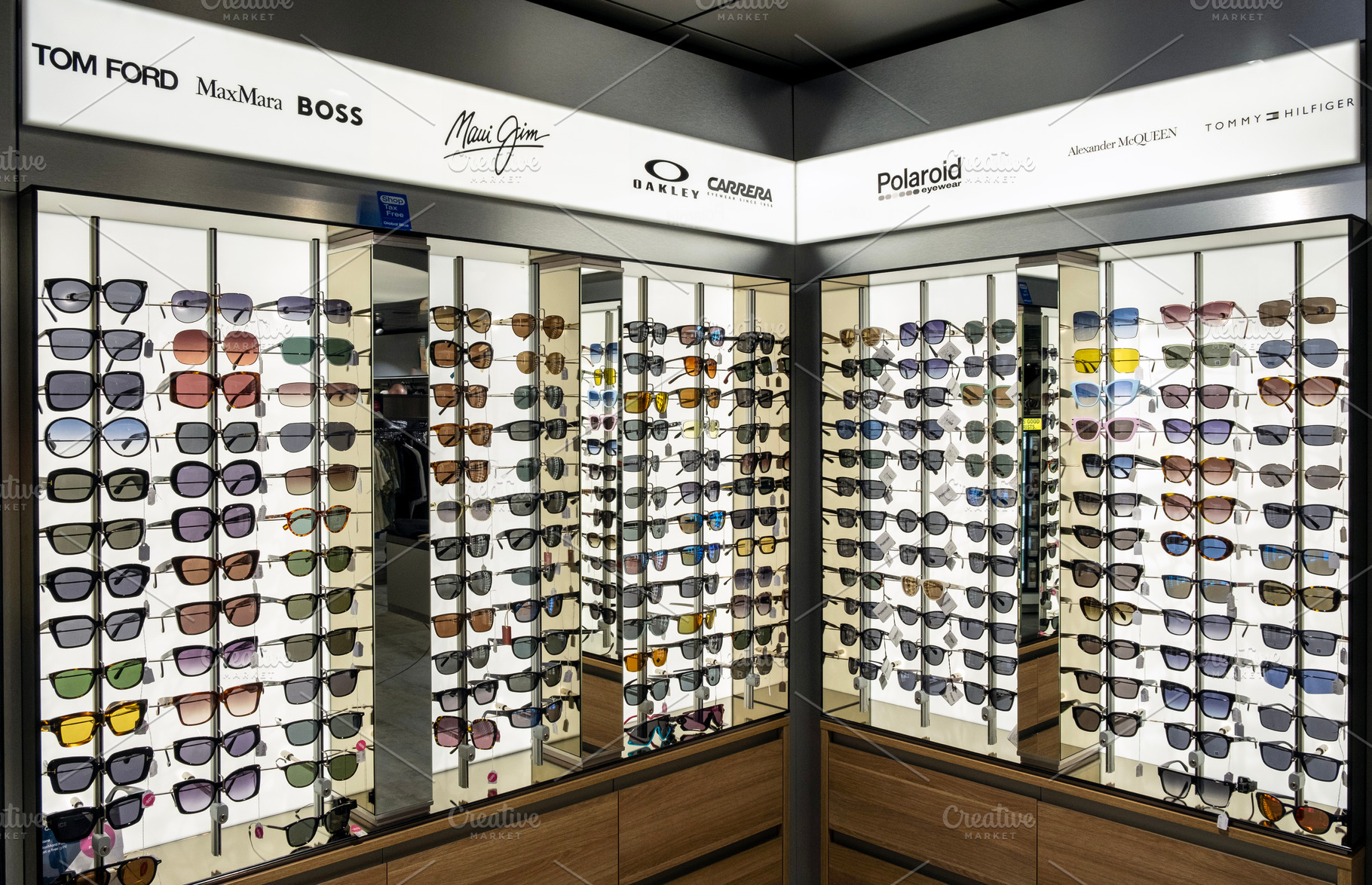 Sunglasses on display in a shop, a Health & Medical Photo by BOOCYS