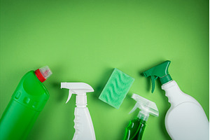 Cleaning supplies on green