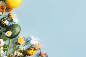 Happy Easter! Modern yellow eggs and spring blossom flat lay wit, a Holiday Photo by Sonjachni