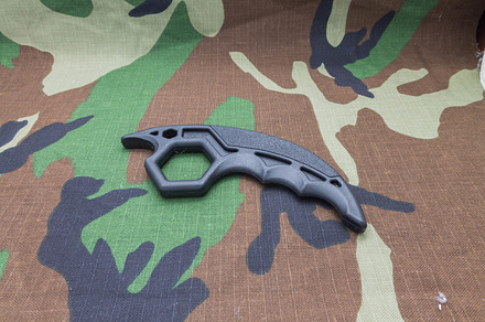 Knuckles on camouflage background., a Sports & Recreation Photo by Stockphoto by vzwer