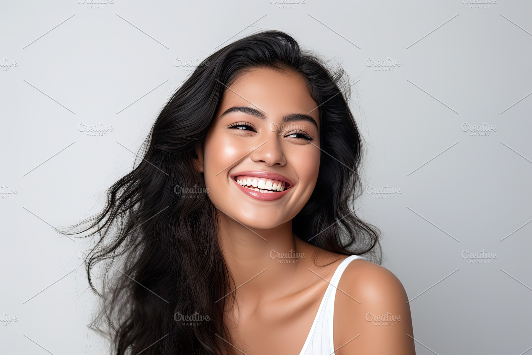 Radiant smile of a young Asian model, a Photo by SaroStock