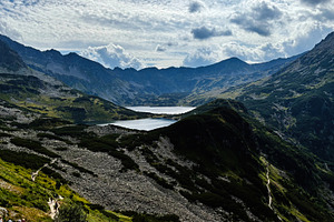 Scenic mountain valley near Zakopane Poland with lake, rugged peaks, and green, a Nature Photo by AS photostudio
