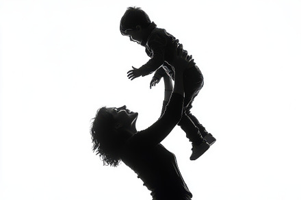 Happy mother lifting her toddler son, a Background Photo by Pixeness