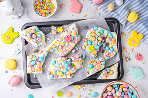 Easter frozen Yogurt Bark with Easter chocolate eggs and sugar s, a Food & Drink Photo by Rimma