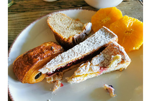 Assorted pastries, cakes, orange, a Food & Drink Photo by sceptical cactus
