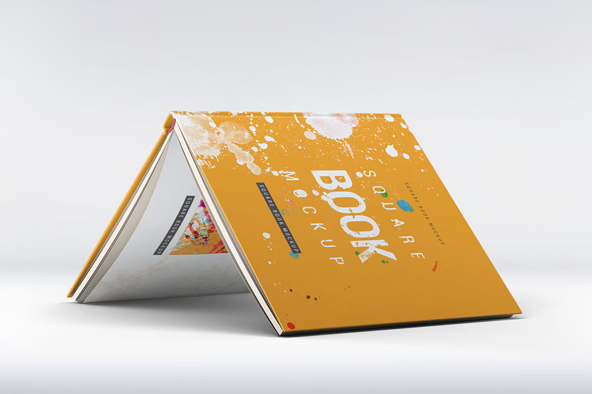 Square Book Mock-Up, a Books & Magazine Mockup by Se٧enStudio (Photo 2 of 9)